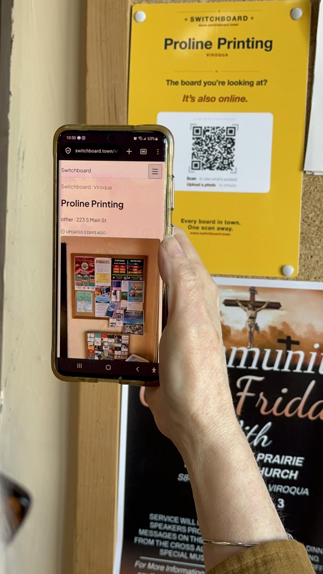 Scanning the Switchboard QR code at a bulletin board with a phone